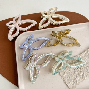 Set of 6 French acetate butterfly hair claws with elegant marble patterns and solid colors