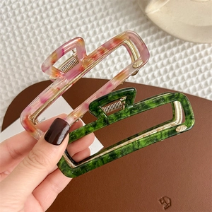 Rectangular hollow acetate hair claw clips with marble and star patterns for women