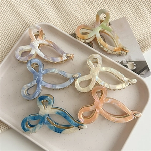 Set of 6 French acetate bow hair claws in various pearlescent colors with metal base