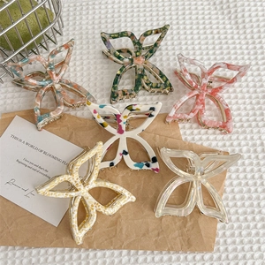 Pinces à cheveux papillon élégantes en acétate avec divers motifs marbrés et floraux