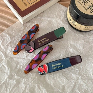 Barrettes à cheveux colorées en acétate avec motif léopard et cœurs pour femmes