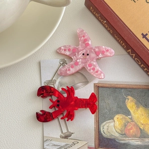 Barrettes à cheveux en acétate avec étoile de mer rose marbrée et homard rouge