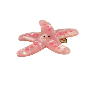 Pince à cheveux étoile de mer en acétate rose avec texture marbrée et pois pour femmes