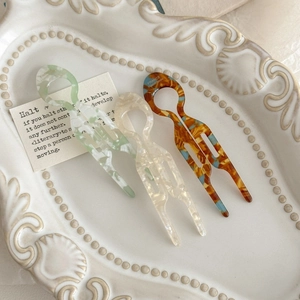 Three-piece set of elegant acetate U-shaped hair pins with marble and tortoiseshell patterns