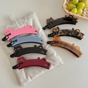 Cute cat banana hair clips in multiple colors like pink and tortoise for high ponytail