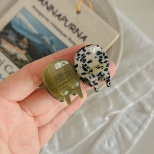 Mini acetate hair clips in jade green and dalmatian pattern with gold handmade lettering