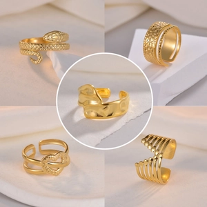 Set of 12 adjustable golden titanium steel rings featuring unique textured snake and heart designs