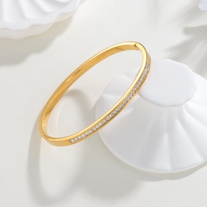 Elegant gold-plated stainless steel bracelet with a single row of sparkling zircon stones