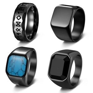 Set of four men's black stainless steel rings with rune engraving and inlaid gemstones