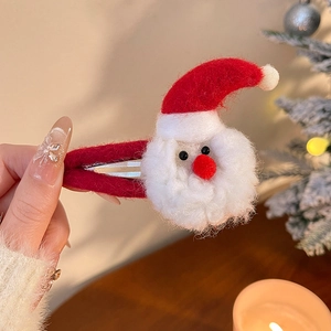 Pince à cheveux Père Noël en peluche avec détails en feutre faits main pour coiffure de Noël