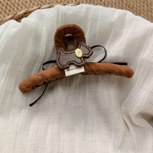 Plush brown dog shark hair claw clip for women with handmade leather puppy detail