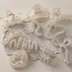 Chic cream acrylic claw clips set with colorful rhinestones and star bow designs