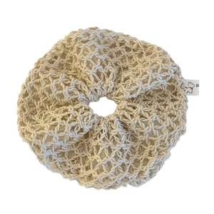 Beige hollow knit crochet hair scrunchie with bohemian style and a woven dog label