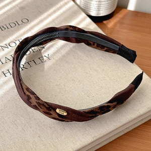 French vintage leopard print twisted headband with anti-slip teeth and gold handmade logo