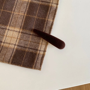 Vintage brown velvet hair clip with a minimalist water drop design for daily styling