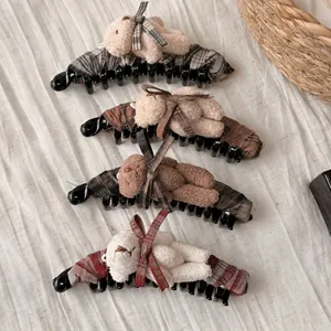 Cute teddy bear banana hair clips in beige and brown colors with bow decoration