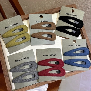 Set of 12 fabric-wrapped teardrop hair clips in olive green, brown, and navy autumn colors