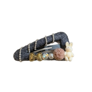 Chic leopard print triangle hair clip with rhinestones, pearls and a cute bunny plush charm