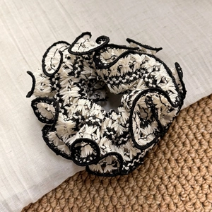 Chic cream and black scrunchie with geometric embroidery and ruffled edges decoration