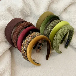 Padded velvet and tweed headband collection in retro colors on soft background