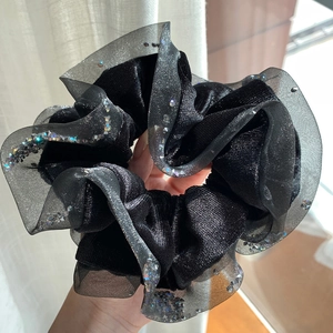 Exquisite black velvet scrunchie with rhinestones and sparkling mesh for elegant hairstyles