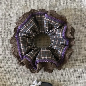 Retro plaid scrunchie with lace edge and purple velvet piping for elegant ponytail styling