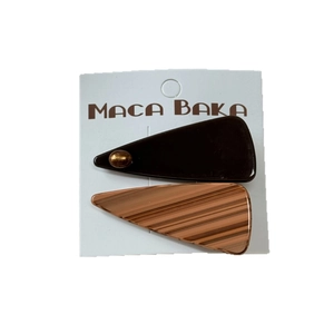 Brown acetate hair clip set with geometric triangle shapes and premium glossy finish