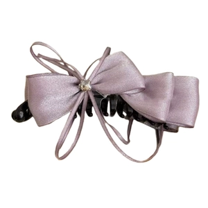 Elegante fermaglio per capelli con fiocco in seta lavanda e strass a forma di stella