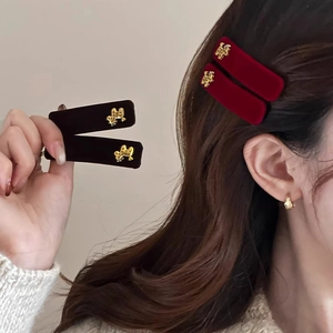 Elegant velvet hair clips in burgundy and black with gold metal bird accents for women