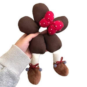 Plush polka dot bow hair scrunchie with cute cartoon character leg charms and soft texture