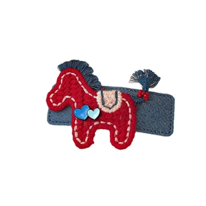 Cute red knitted horse hair clip with blue denim base and heart details for kids