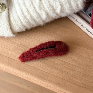 Deep red plush heart hair clip for women with soft texture and black metal BB clip base