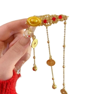 Chinese New Year hair clip with golden sycee, copper coins and red beads tassels