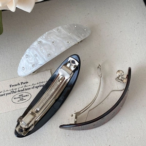 Set di tre fermagli per capelli in acetato con venature marmoree bianche e strass