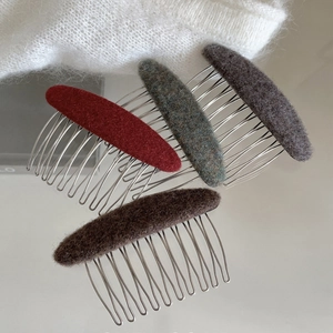 Set of 4 wool-textured winter hair combs in red, green, grey, and brown colors