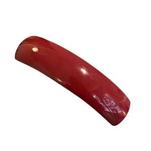 Elegant red acetate hair clip with a smooth glossy finish and handmade French lettering