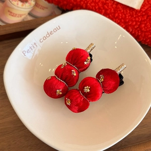 Neujahrs-Plüsch-Haarspangen in Rot mit Goldfaden und Sternpailletten für Kinder
