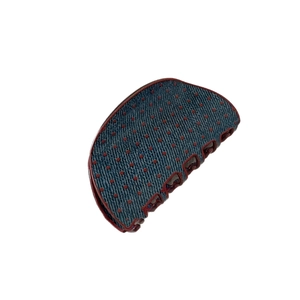 Retro denim blue hair claw clip with red polka dots and vibrant red teeth accents