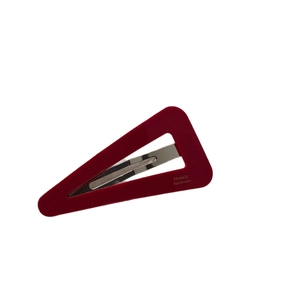 Retro red acetate triangle hair clip with France Handmade text on white background
