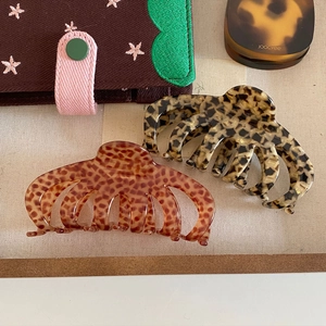 French vintage acetate hair claws in tortoiseshell and speckled brown patterns