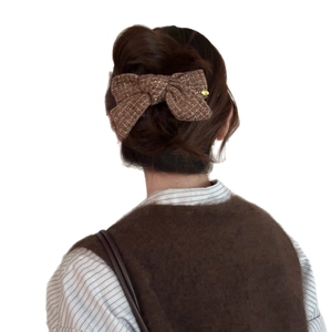 Brown tweed bow hair clip for women, elegant ribbon accessory for hair styling