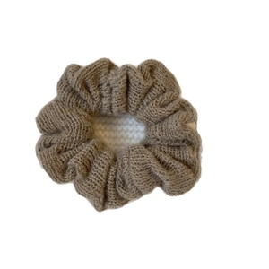 Classic light brown knitted scrunchie with thick yarn texture and soft woolen finish