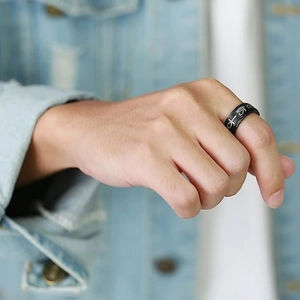 Men's black titanium spinner ring with Ankh and Eye of Horus ancient Egyptian symbols