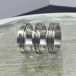 Set de 3 anillos giratorios con diseños de tortuga, olas y hojas en acero plateado