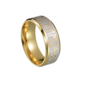Macro detail of Nordic Viking rune ring showing brushed silver center and polished gold edges