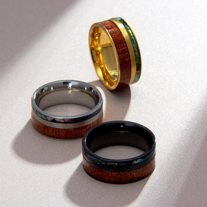 Fashionable titanium steel ring with inlaid wood grain and iridescent abalone shell inlay