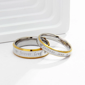 Silver and gold titanium steel couple rings engraved with Forever Love and hearts