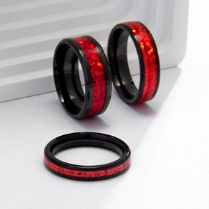 Three-piece titanium steel ring set with vibrant red imitation opal inlay and black finish