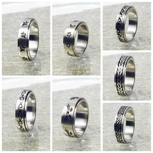 Set de seis anillos giratorios de titanio con motivos naturales para aliviar el estrés