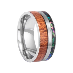 Macro detail of men's titanium steel ring featuring wood grain and shell inlay texture